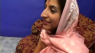 This amateur Indian girl takes on two hung guys at once