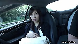 Japanese brunette Karin Asahi sucks dick in the car uncensored.