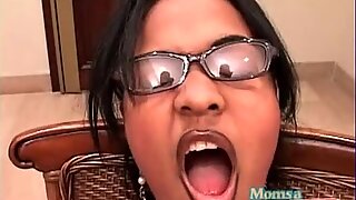 Curvy girl in glasses gives a beautiful blowjob